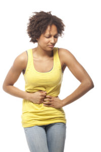 Woman suffering from a stomach ache